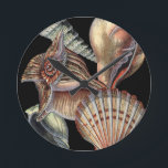 Treasures of the Sea Round Clock<br><div class="desc">This art print displays the finest things in nature within the ocean. Find all the different types of sea life in this image including a Conch Seashell,  Sand Dollars,  and Reefs buried deep in the sea. This art collection is a must have in your next Zazzle products.</div>