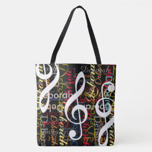 treble clefs with a pattern of colourful names tote bag