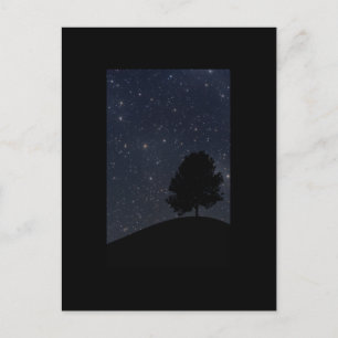 Tree against the starry night sky postcard