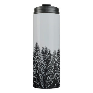 TREE COVERED SNOW UNDER CLOUDY SKY THERMAL TUMBLER