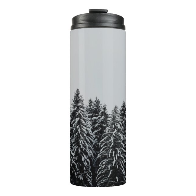 TREE COVERED SNOW UNDER CLOUDY SKY THERMAL TUMBLER (Front)
