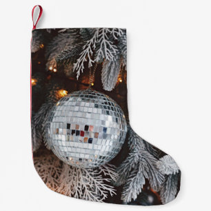 Tree decorations background with christmas light small christmas stocking
