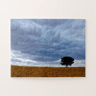 Tree in an empty field jigsaw puzzle