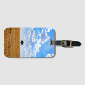 Tree in an harvested wheat field luggage tag