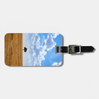 Tree in an harvested wheat field luggage tag