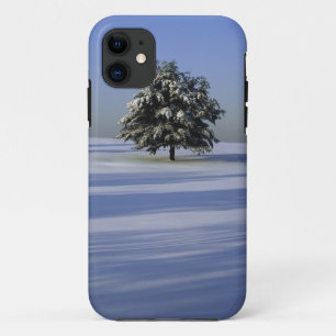 Tree in snow covered landscape iPhone 11 case