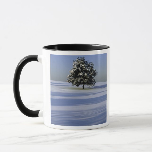 Tree in snow covered landscape mug (Left)
