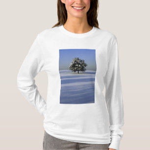 Tree in snow covered landscape T-Shirt