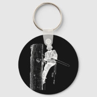 Tree Surgeon Arborist at work present Chainsaw Key