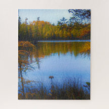 trees across a lake in fall puzzle