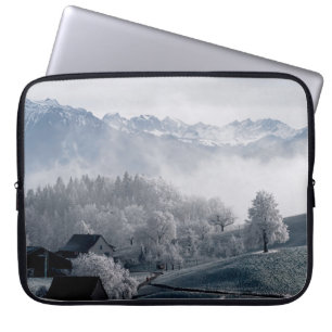 TREES BESIDE SNOW CAPPED MOUNTAIN DURING DAYTIME LAPTOP SLEEVE