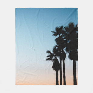 Trees during golden hour fleece blanket