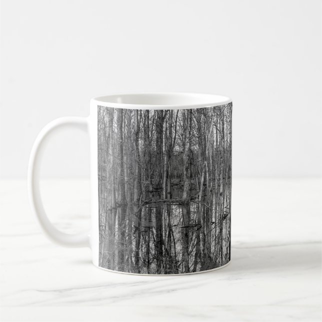 Trees in a forest in black and white. beauty in na coffee mug (Left)