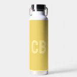 Trend Colour Soft Yellow Monogram Water Bottle<br><div class="desc">Introducing the trendy spring colour: Soft Yellow. Modern and stylish Water Bottle with customisable monogram in a modern font and light yellow colour. Its simple and clean design in a solid colour offers a timeless and classic appeal. Explore our spring trend colours for more products in the same colour or...</div>