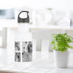 Trendy Collage Family Photo Black & White Initial 532 Ml Water Bottle<br><div class="desc">Introducing our Trendy Collage Five Family Photo Black & White with Initial in Centre . This personalised and stylish collage is the perfect way to showcase your family's cherished memories in a modern and elegant way. Featuring a sleek black and white colour scheme, this collage allows you to highlight four...</div>