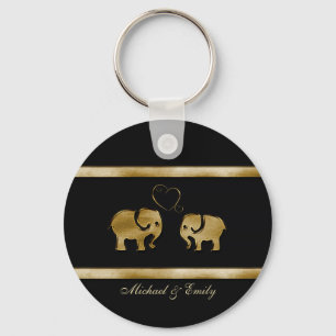 Trendy cute black /golden elephant in love key ring