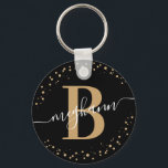 Trendy Girly Black Gold Name Script Monogrammed Key Ring<br><div class="desc">Girly, elegant, trendy, modern, black and gold, monogram initial name script custom personalised monogrammed keychain. Featuring a monogram initial and a girly name script in a hand lettered calligraphy swash tail font and dotted circle frame around your monogram. Perfect feminine gift for sister, mother, girlfriend, birthday, wedding, bridal shower, sweet...</div>