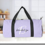 Trendy Lavender Black White Script Monogram  Duffle Bag<br><div class="desc">This personalised duffel bag features a monogram and first name in modern black and white script on a stylish lavender background.</div>