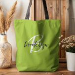 Trendy Lime Green Black White Script Monogram  Tote Bag<br><div class="desc">This elegant personalised tote bag features a monogram and first name in modern black and white script on a trendy lime green background.</div>