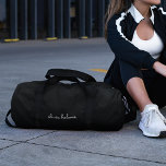 Trendy Monogram | Modern Black Script Name Duffle Bag<br><div class="desc">A simple stylish custom monogram design in an informal casual handwritten script typography in striking monochrome black and white. The monogram can easily be personalised to make a design as unique as you are! The perfect trendy bespoke gift or accessory for any occasion.</div>