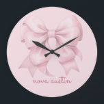 Trendy Pink Bow Personalised With Name Monogram Large Clock<br><div class="desc">Transform any room with the Trendy Pink Bow Personalised With Name Monogram Large Clock, a perfect blend of style and personalisation. This elegant clock features a preppy coquette bow in a soft pink watercolor design, making it a charming addition to any space. The personalised name monogram adds a unique touch,...</div>