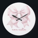Trendy Pink Bow Personalised With Name Monogram Large Clock<br><div class="desc">Elevate your space with the Trendy Pink Bow Personalised With Name Monogram Large Clock, a stunning piece that blends timeless elegance with modern flair. Featuring a chic preppy coquette bow in a soft watercolor design, this clock embodies a vintage girly aesthetic that adds a touch of charm to any room....</div>