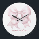 Trendy Pink Bow Personalised With Name Monogram Large Clock<br><div class="desc">Elevate your space with the Trendy Pink Bow Personalised With Name Monogram Large Clock, a stunning piece that blends timeless elegance with modern flair. Featuring a chic preppy coquette bow in a soft watercolor design, this clock embodies a vintage girly aesthetic that adds a touch of charm to any room....</div>