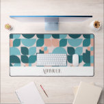 Trendy Teal & Pink Geometric Pattern Desk Mat<br><div class="desc">This trendy and modern desk mat features a light pink background with geometric pattern in teal,  turquoise blue,  and pink. Personalise it for your needs. You can find matching products at my store.</div>