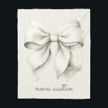 Trendy White Bow Personalised With Name Monogram Fleece Blanket<br><div class="desc">Introducing our Trendy White Bow Personalised With Name Monogram Fleece Blanket, the perfect blend of sophistication and charm for any special occasion. Featuring an adorable coquette bow design, this blanket boasts a trendy aesthetic that's ideal for newborns, toddlers, and even adults. The elegant white bow, combined with a personalised monogram,...</div>