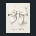 Trendy White Bow Personalised With Name Monogram Fleece Blanket<br><div class="desc">Introducing our Trendy White Bow Personalised With Name Monogram Fleece Blanket, the perfect blend of sophistication and charm for any special occasion. Featuring an adorable coquette bow design, this blanket boasts a trendy aesthetic that's ideal for newborns, toddlers, and even adults. The elegant white bow, combined with a personalised monogram,...</div>