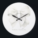 Trendy White Bow Personalised With Name Monogram Large Clock<br><div class="desc">Elevate any room with the Trendy White Bow Personalised With Name Monogram Large Clock, a stunning blend of classic charm and modern style. Featuring a delicate watercolor white bow, this clock is perfect for adding a touch of elegance to a baby girl’s room or a stylish office. Its versatile design...</div>
