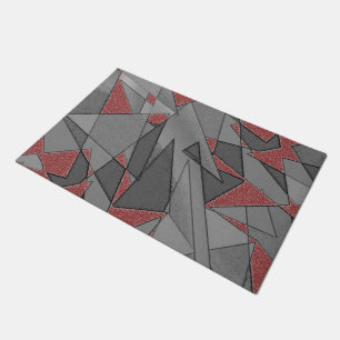 Triangular rough cutouts, over red background doormat