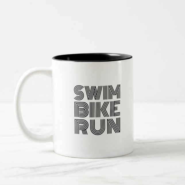Triathlon black design Two-Tone coffee mug (Left)