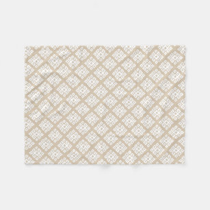 Tribal geometric buff and white patterned blanket