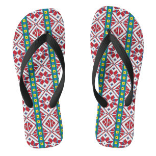 Tribal red, blue, and white star geometric pattern flip flops