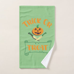 Trick or treat crossbones Halloween pumpkin face Hand Towel