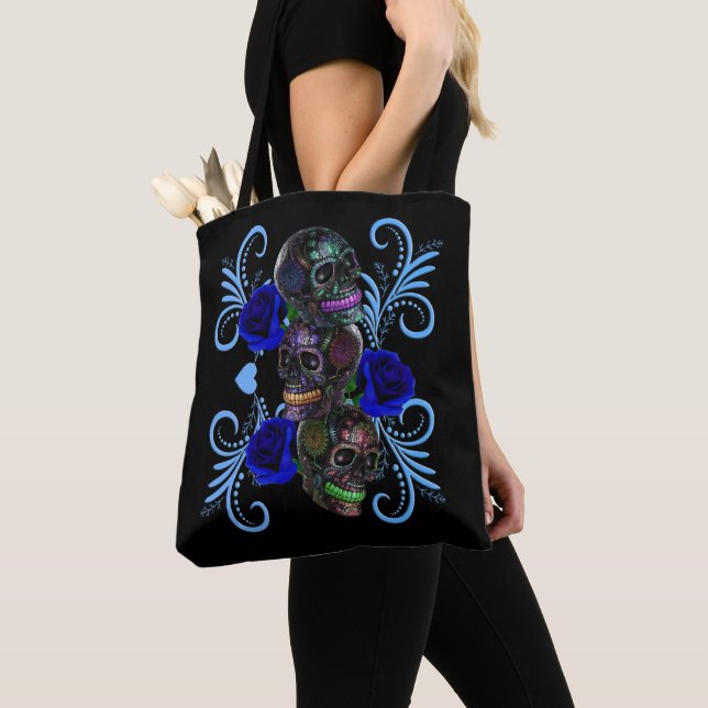 Triple Black Day Of The Dead Skulls Blue Roses Tote Bag (Close Up)