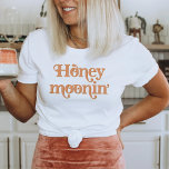 TRIXIE Retro 70's Themed Honeymoonin' Bride T-Shirt<br><div class="desc">This honeymoonin' bride t shirt features a retro 70's themed font with a creamy orange colouring. This shirt makes the perfect gift for a bride-to-be at her bridal shower or bachelorette weekend so she can wear it on her honeymoon. Colours are editable! Click 'edit design' to create your own colours....</div>