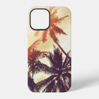Tropical beach background with palm trees silhouet