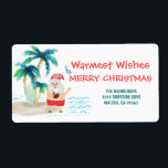 Tropical Beach Santa Christmas Return Address<br><div class="desc">Add some fun and festivity to your holiday mail with these cute Christmas return address labels. Santa is on vacation, surfing and relaxing on a tropical island beach. With his toes in the sand, a drink in his hand, palm trees and an ocean breeze he sends his "Warmest Wishes" and...</div>