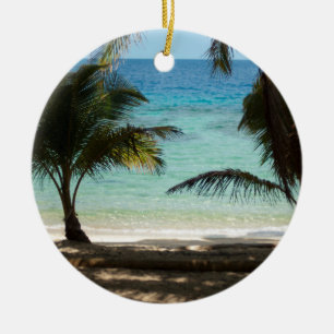 Tropical beach shaded by palms ceramic tree decoration
