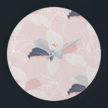 Tropical Blush Floral Wall Clock<br><div class="desc">A modern tropical design,  creating a beautiful pattern from digitally sketched flowers. The inspiration came from a vintage shirt,  adding a modern twist by skeeping the lines clean and graphic. This colourway is a soft pink with dusk blue, grey and rose gold highlights.</div>