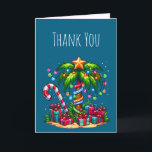 Tropical Christmas Palm Tree Thank You Card<br><div class="desc">Thank You card with a seasonal holiday image. A tropical palm tree decorated in festive lights with a star on top. A giant red and white candy cane sticking out of the sand. Christmas presents under the tree. Whimsical and fun.</div>