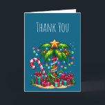 Tropical Christmas Palm Tree Thank You Card<br><div class="desc">Thank You card with a seasonal holiday image. A tropical palm tree decorated in festive lights with a star on top. A giant red and white candy cane sticking out of the sand. Christmas presents under the tree. Whimsical and fun.</div>