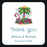 Tropical Christmas Palm Tree Thank You Square Sticker<br><div class="desc">Thank you stickers with a seasonal holiday image. A tropical palm tree decorated in festive lights with a star on top. A giant red and white candy cane sticking out of the sand. Christmas presents under the tree. Whimsical and fun.</div>