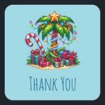 Tropical Christmas Palm Tree Thank You Square Sticker<br><div class="desc">Thank you stickers with a seasonal holiday image. A tropical palm tree decorated in festive lights with a star on top. A giant red and white candy cane sticking out of the sand. Christmas presents under the tree. Whimsical and fun.</div>