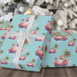 Tropical Christmas Wrapping Paper<br><div class="desc">Get into the holiday spirit with this unique Christmas wrapping paper featuring a relaxed Santa Claus in sunglasses lounging in a pink flamingo floaty in the ocean. Perfect for wrapping gifts with beachy holiday vibes, this paper is ideal for anyone living in tropical places like Florida, Hawaii, or the Bahamas,...</div>