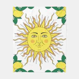 Tropical citrus lemon fruits with flowers frame an fleece blanket