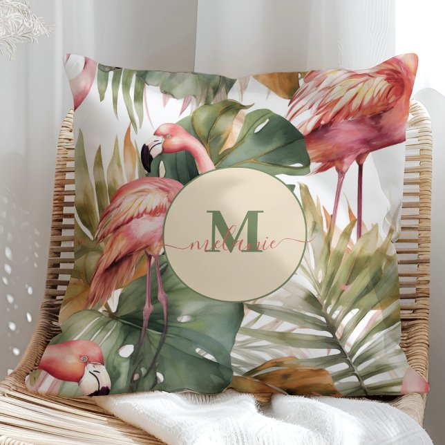 Tropical Flamingo Monstera Custom Name Cushion (Tropical Flamingo Monstera Custom Name Throw Pillow on a sunny rattan chair.)