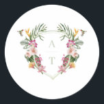Tropical Floral Monogram Wedding Classic Round Sticker<br><div class="desc">Welcome to the world of the tropics with our Tropical Floral Monogram Wedding sticker! This stunning design features a colourful tropical monogram crest with cute hummingbirds,  that are sure to catch your guests' eyes. The monogram crest is adorned with tropical flowers such as hibiscus,  ginger,  orchid and tropical greenery.</div>